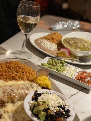 Cheese enchilada plate with rice & beans; Pork Chile Verde with rice & beans.