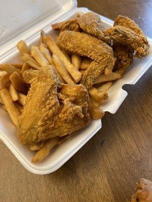 Chicken wings and French fries