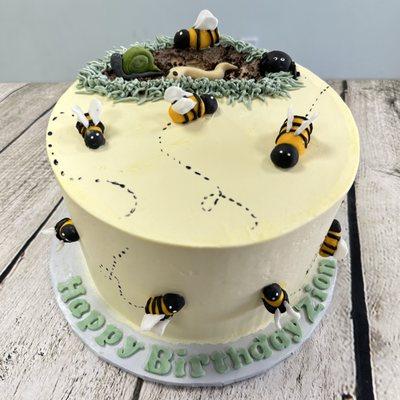 Custom cake with bees and bugs