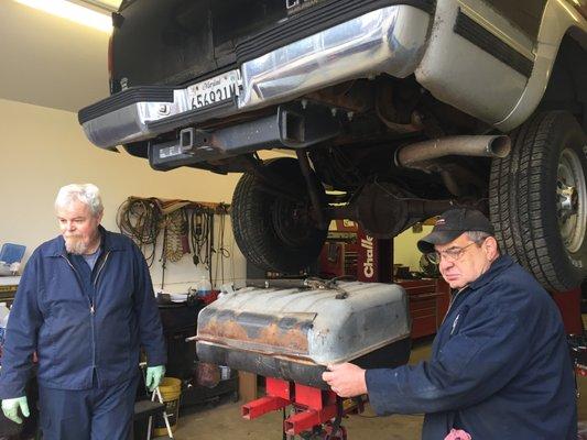 Taking down a fuel tank on a Chevy Suburban to replace inoperable fuel pump.