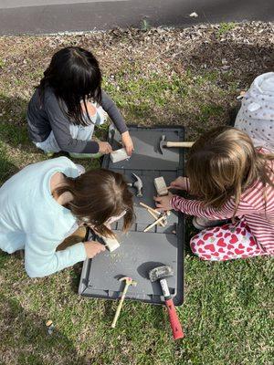 Lower academy students during their excavation experiment.