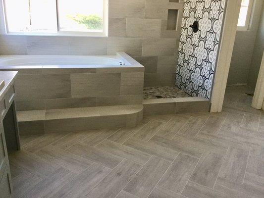 Herringbone Porcelain Tile Plank In bathroom floor