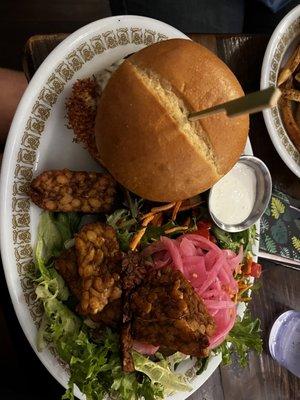 The local as a veggie patty, house salad (with cheese curds comparable to Wisconsin!) and tempeh