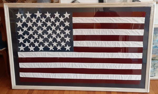 Hand made flag framed for a customer