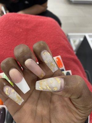 Nails are also Crooked. Hot mess. She was just going to put a clearcoat on them and send me on my way.