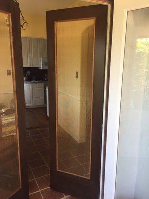 French doors with custom trim and copper screens.