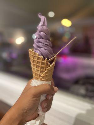 Ube on a waffle cone with mochi at the bottom!