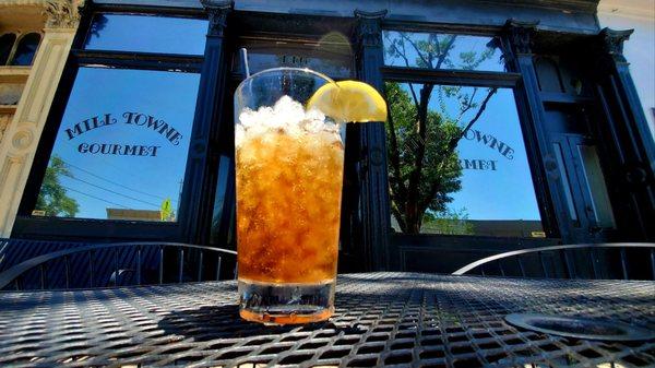 MILL TOWNE GOURMET RESTAURANT exterior table with ice tea in Griffin, GA.