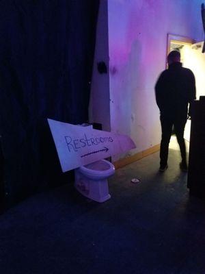 Bathrooms hiding behind the stage