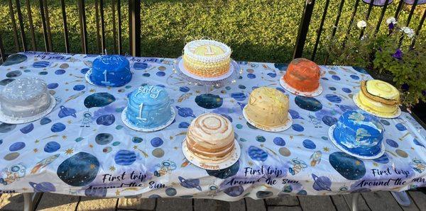 Sun and planets for our twins 1st birthday!  Each cake was a different flavor and different flavored frosting.