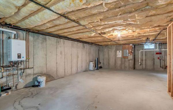 Unfinished basement prior to craftsmanship by DM Plastering