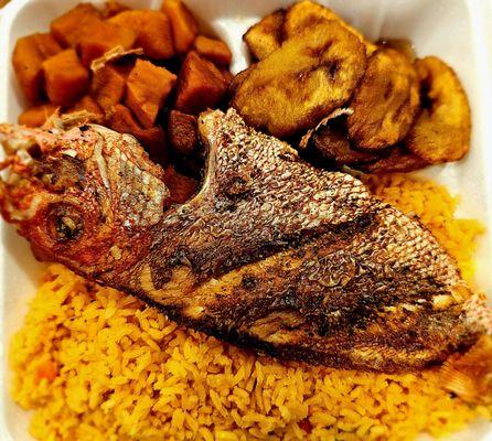 Fried Red Snapper, Plantains, Yams, and Spanish rice.