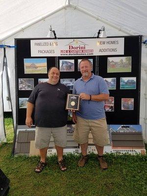 Partners, Dominic Manzella and Gregg Wood of Dorini Log & Custom Homes receiving the 'Outstanding Concessionaire' Award @ 2016 Wash Co Fair