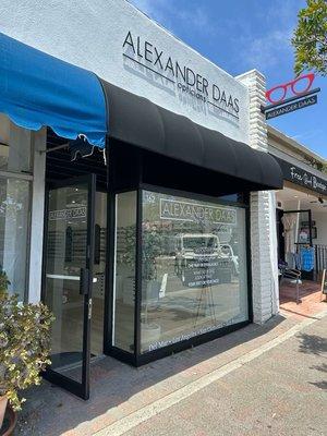 Repainted store front metal framing for Alexander Daas Opticians in San Clemente.