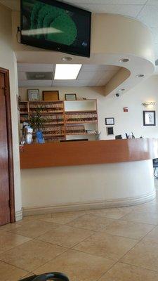 Front desk with a tv