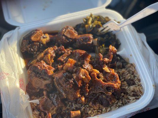 Large Oxtails with rice and peas and collard greens. One of Atlanta best Jamaician restaurants.