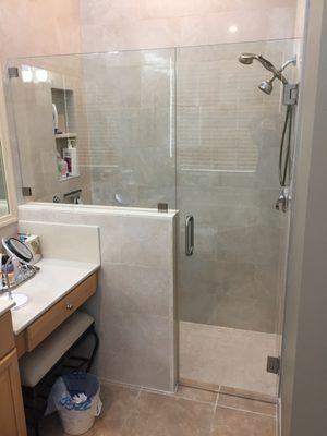 FRAMELESS SHOWER ENCLOSURE