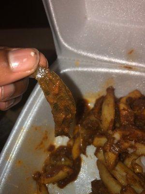 Found this leaf in my chili cheese fries .