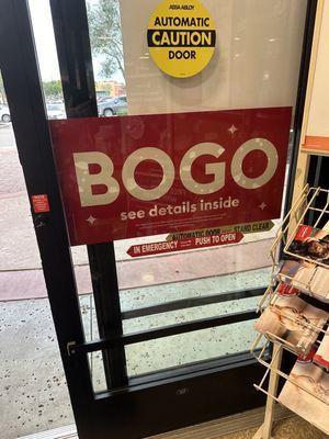 BOGO (buy one get one) but once you get in the store, it's buy three get one.