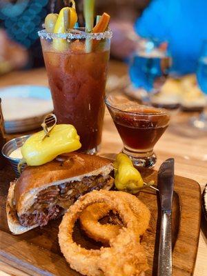 The Steakhouse burger w onion rings, Manhattan and Bloody Mary. Hit the spot!!