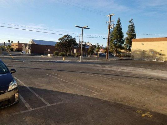 Plenty of customer parking in rear of building off Raymond.