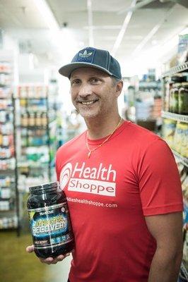 Eddie Reymond with the protein powder he helped formulate, Millennium Athlete's Recovery