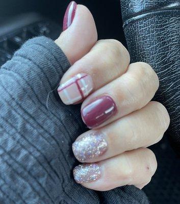 Christmas Nails. Plaid, maroon, pink glittery polish.