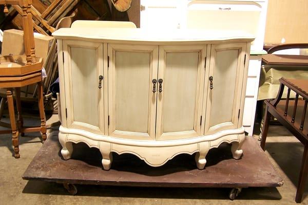 French provincial buffet painted soft white with pastel doors and van dyke brown glaze