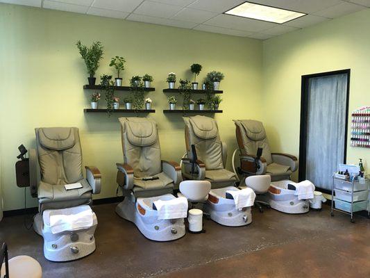 Massage chairs for pedicures.