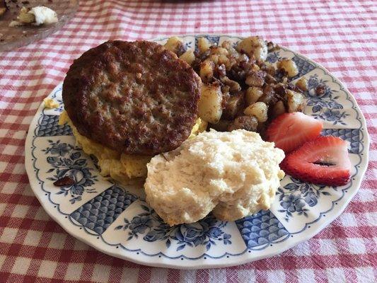 Breakfast sandwich with sausage.