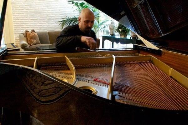 Tuning a piano to perfection.