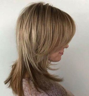 Baby blonde high lights brings this hair from summer to sensational! Hair by Jill.