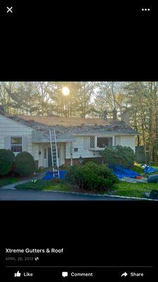 Removing old shingles to install a new Roof