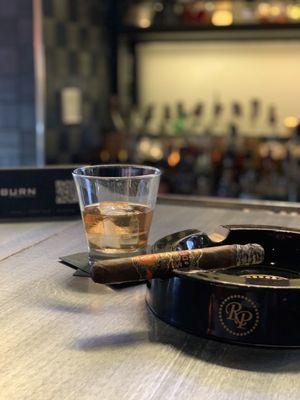 Rocky Patel DBS (Double Broadleaf Selection) and Basil Hayden.  My absolute favorite!