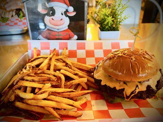 Juicy char grill burger, and tasty skin on fries.