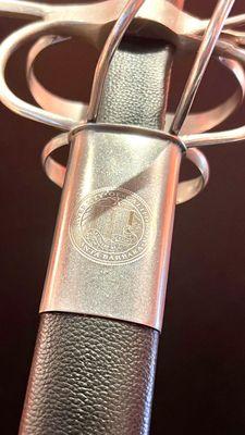 Logo Engraving on a Sword