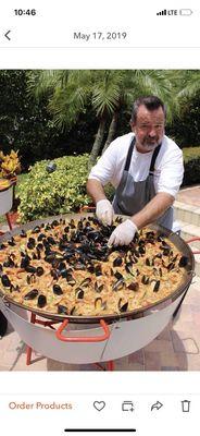 Chef Gianni preparing Paellas