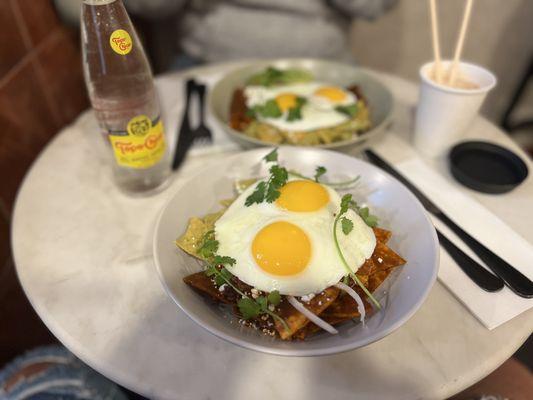 Chilaquiles divorciados, with an added egg and chicharrón prensado.