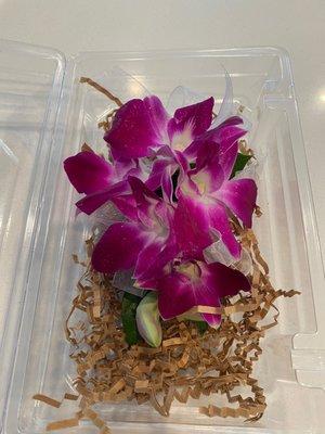 Purple orchids corsage