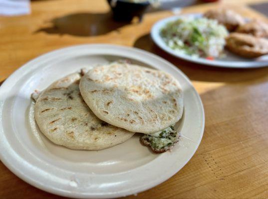 Revuelta and loroco con queso pupusas