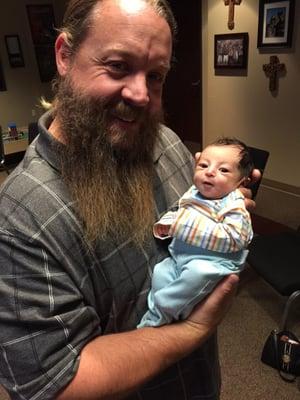 My 4 days old newborn after getting adjusted. Looking happy.