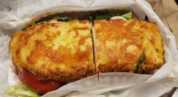 Lunch is served: Assorted with sweet red peppers on jalapeño cheddar cheese bread