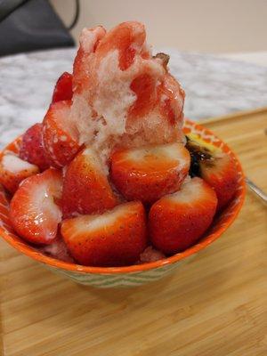 Strawberry shaved ice cream with pudding, tapioca, herbal jelly, lychee jelly (asian Jello-O), and condensed milk. SOOOO GOOD!!!