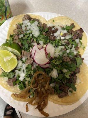 Two asada tacos and two lengua tacos