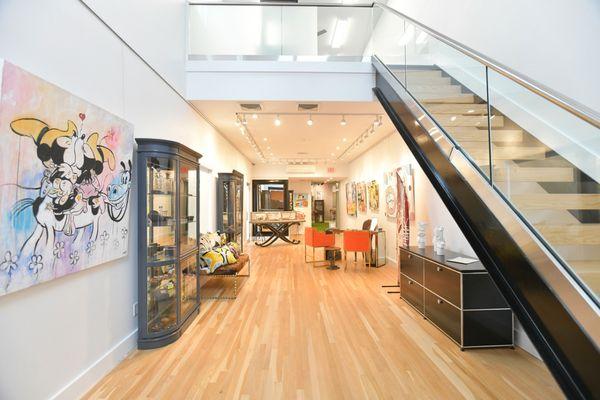 Chic, sleek new gallery two level space with three jewel, art and gift filled showrooms located between Bobby Van's and Candy Kitchen!