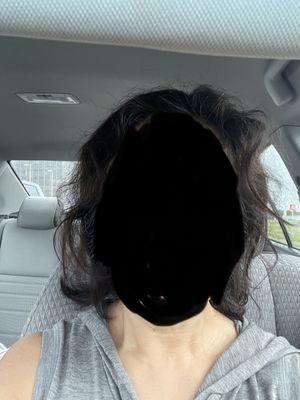 This is what I look like in the car after leaving their shop. I wanted shoulder length layer but what I got was frizzy uneven mess!