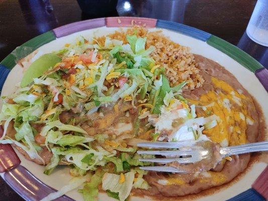 Soggy tostada with beans and rice.