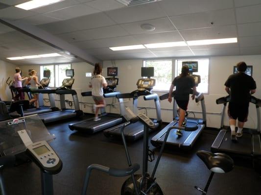 SARC has a cardio room, and other machines throughout the facility.  In all, SARC has around 60 cardio machines some with tvs.