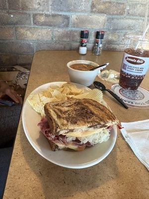 1/2 Reuben sandwich. At least 5 inches tall with lots of lean meat.