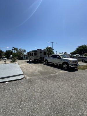 Very tight! There's an open spot directly to the left of the Rv.